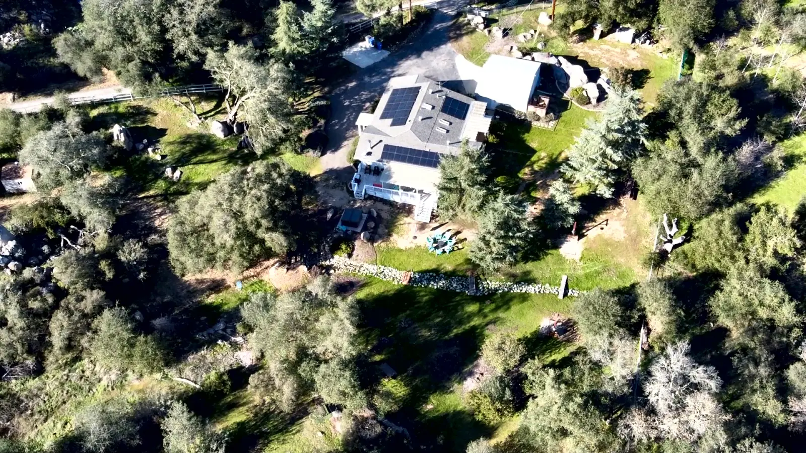 Mountain Retreat from the air, eight acres of oak and granite at the foot of Iron Mountain.